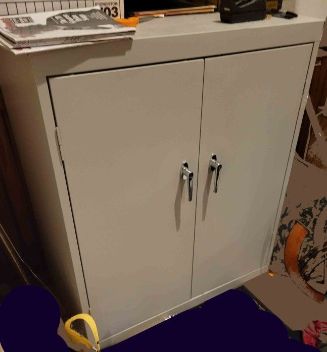 Sandusky metal locking storage cabinet with key