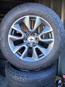 2022 OEM ORIGINAL TAKEOFFS CHEVY SILVERADO RST INCH HAVE TPMS SENSORS  TIRES BRIDGESTONE ALL-TERRAIN 90  % $ 1100 FIRM. 