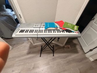Key board , stand and books