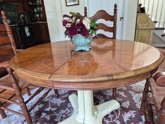 Oak dining table and ladderback chairs