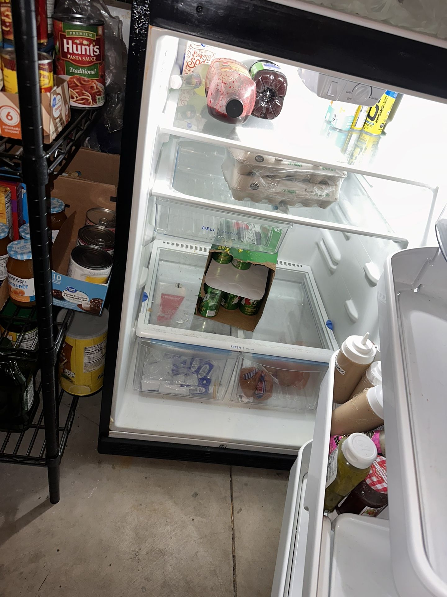 Black Fridge And Freezer Used In Garage