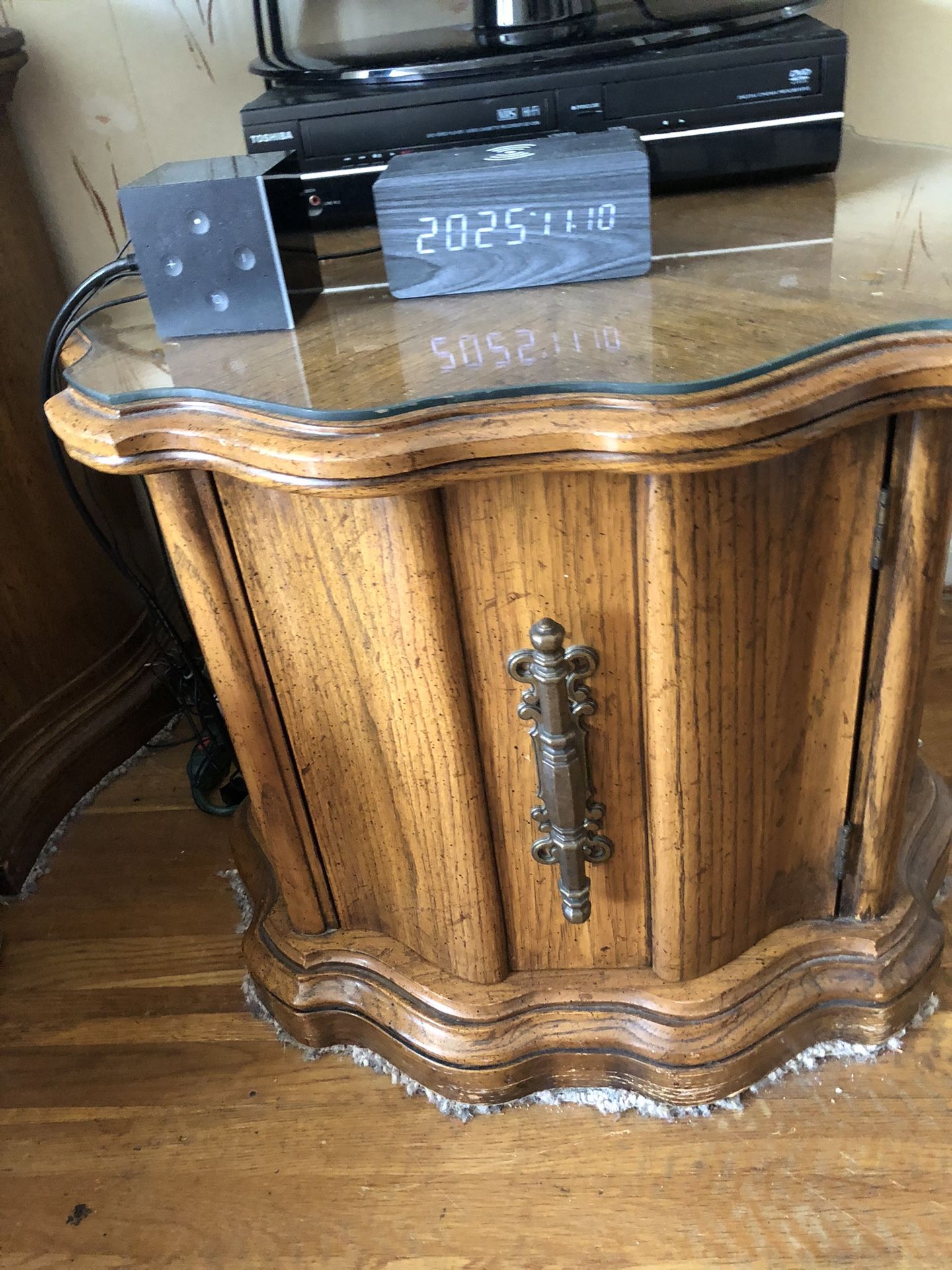 Two Matching Solid Wood Glassed Top End Tables $75 Each