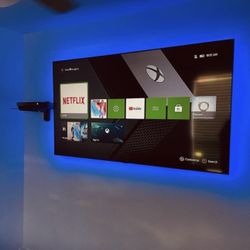 MOUNT TV ON WALL 