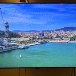50” Samsung 4K Smart TV + Modern TV Stand – $220 (Bundle Deal!)