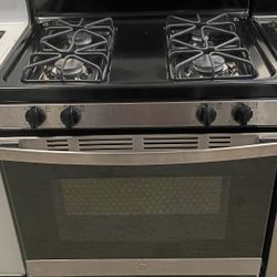 Stainless GE gas stove four burners with warranty delivery available fee depends on address 🏠🚛🛣️