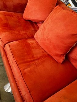 Orange two person couch