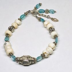 Silver tone bracelet with glass and stones