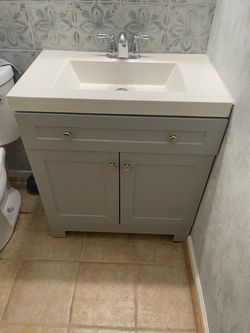 30” Vanity and fixture like new
