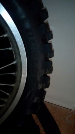 Cr125 rear wheel complete and new