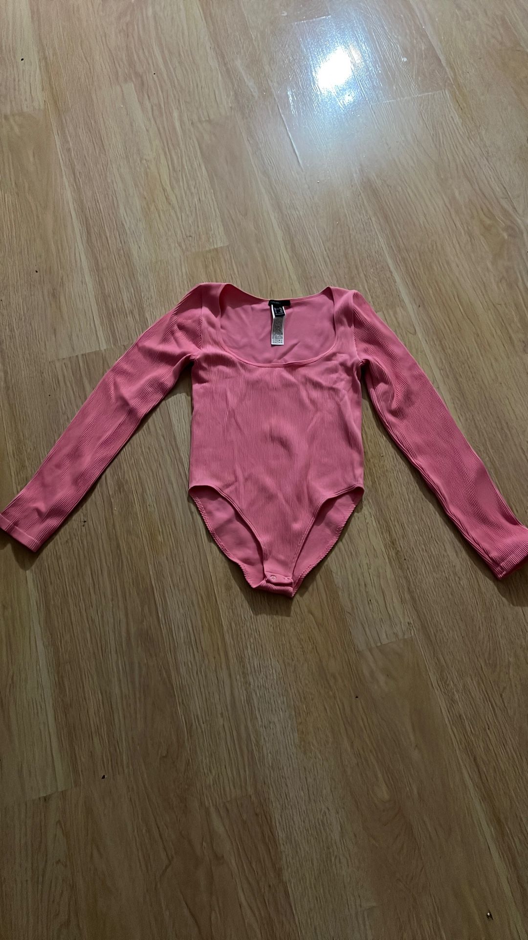 Pink stretchy bodysuit