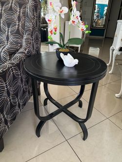 1 side table 24”diameter and 24” high in good condition