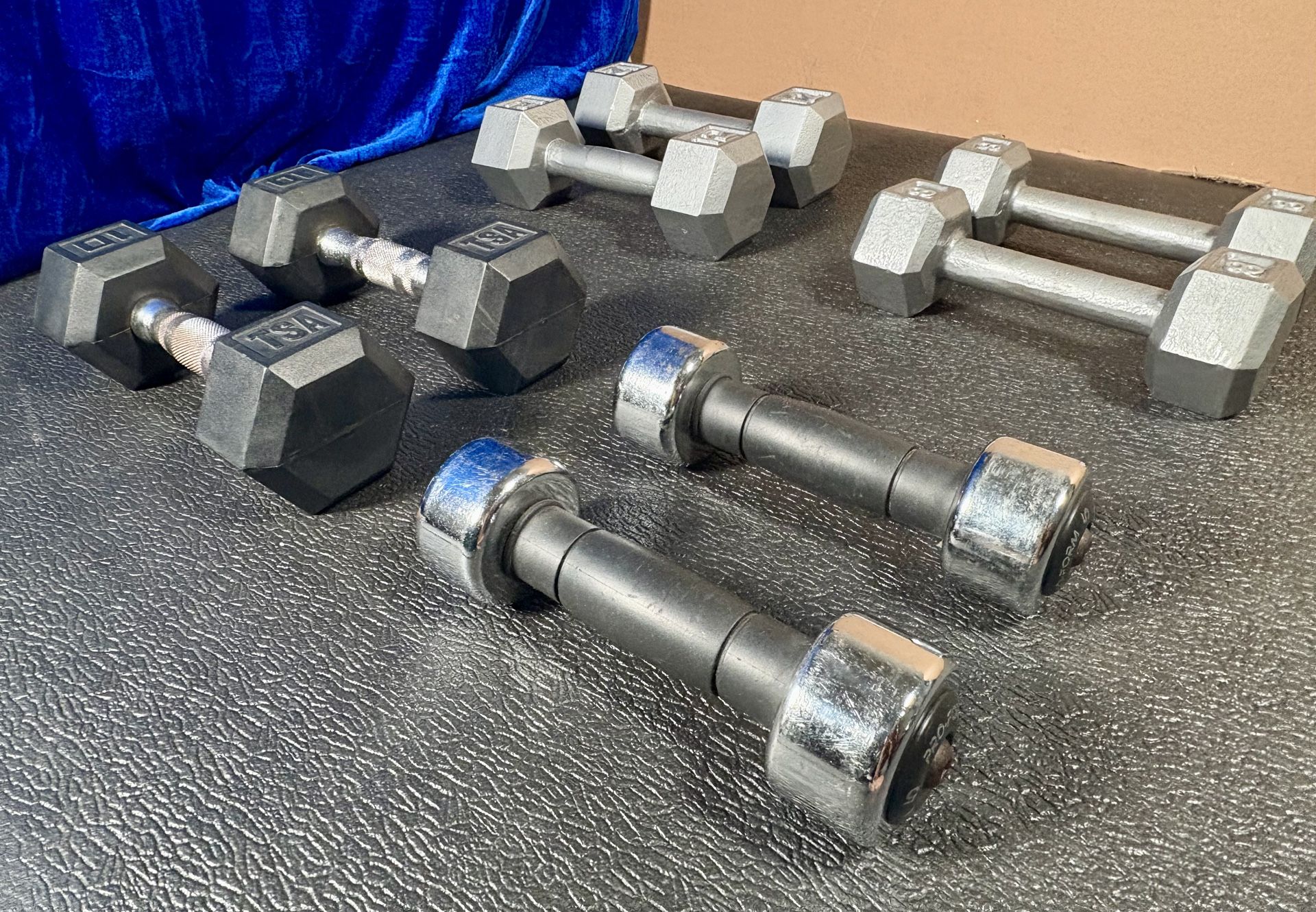 Set of Hex Cast Iron Dumbbells ( light) 12#, 10#, 8# and 5 #   In total: 70 pounds.