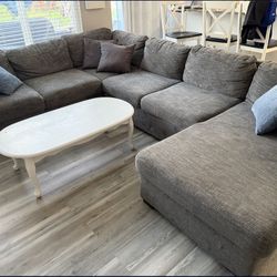 Comfy gray sectional sofa with storage and pull-out bed