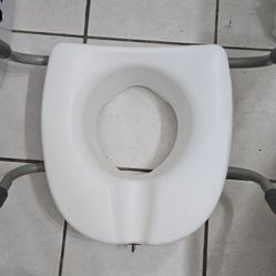 Raised Toilet Seat Round... Capacity Front Toilet Seat in white