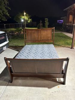 Queen size wood bed frame and mattress asking 150