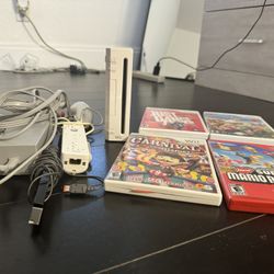 Nintendo Wii System + 4 Free Games