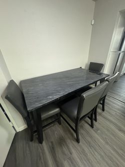 Black Marble Top With 6 Piece Rectangular Dining Set with Faux Leather Chairs and Bench