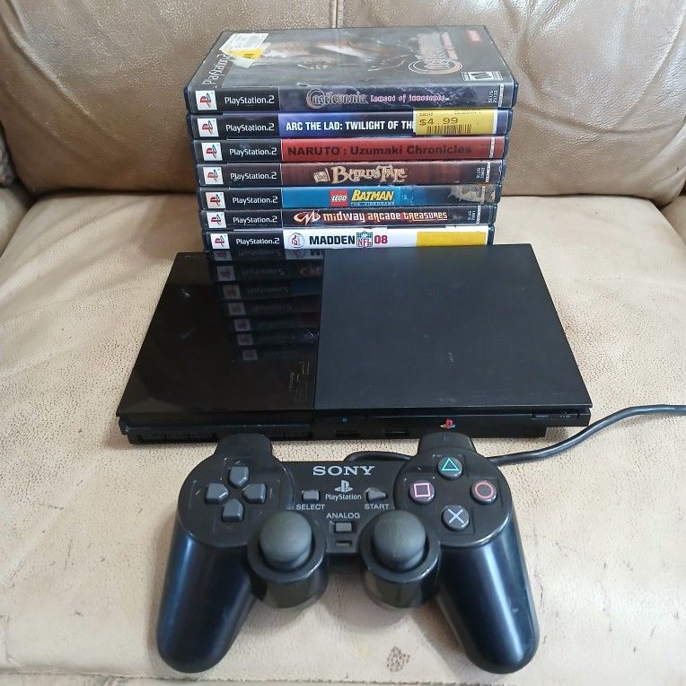 Late Slim Playstation 2 ps2 with contoller memory card plus 10 games