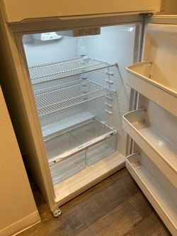 Frigidaire refrigerator like new less than two years old, $350 purchased at Home Depot