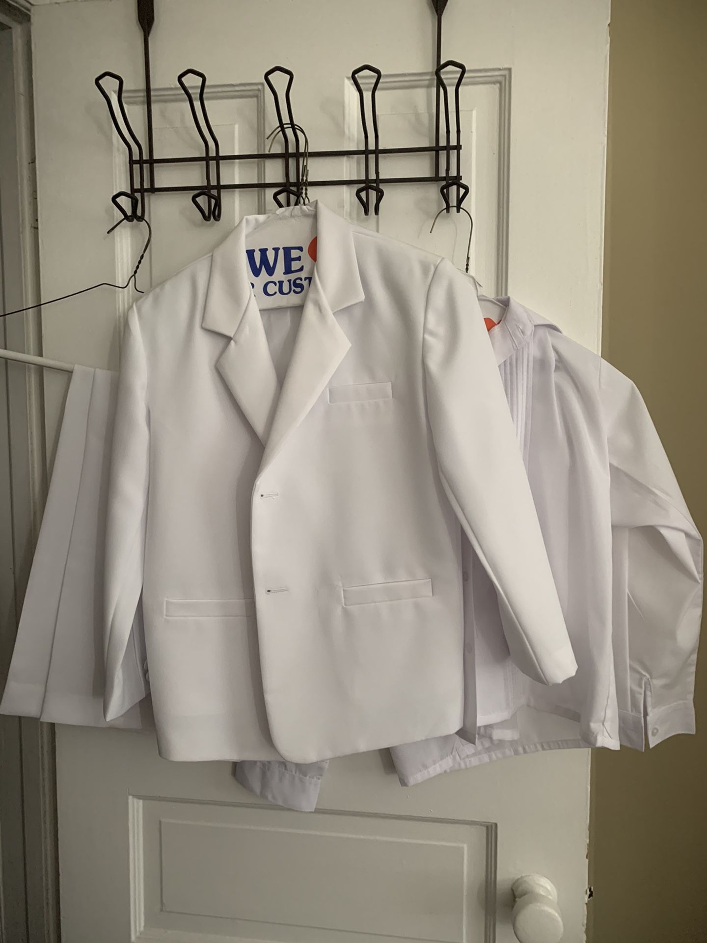 Boys communion outfit 4 piece set new with tags, had it hemmed for my son and it didn’t fit him south philly