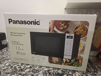 New Sealed Microwave
