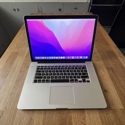 Apple MacBook Pro 15 Inch Retina Laptop - lntel i7 Quad-Core Processor / 16GB Memory/ 512GB SSD Hard Drive / MacOS Monterey Installed 
