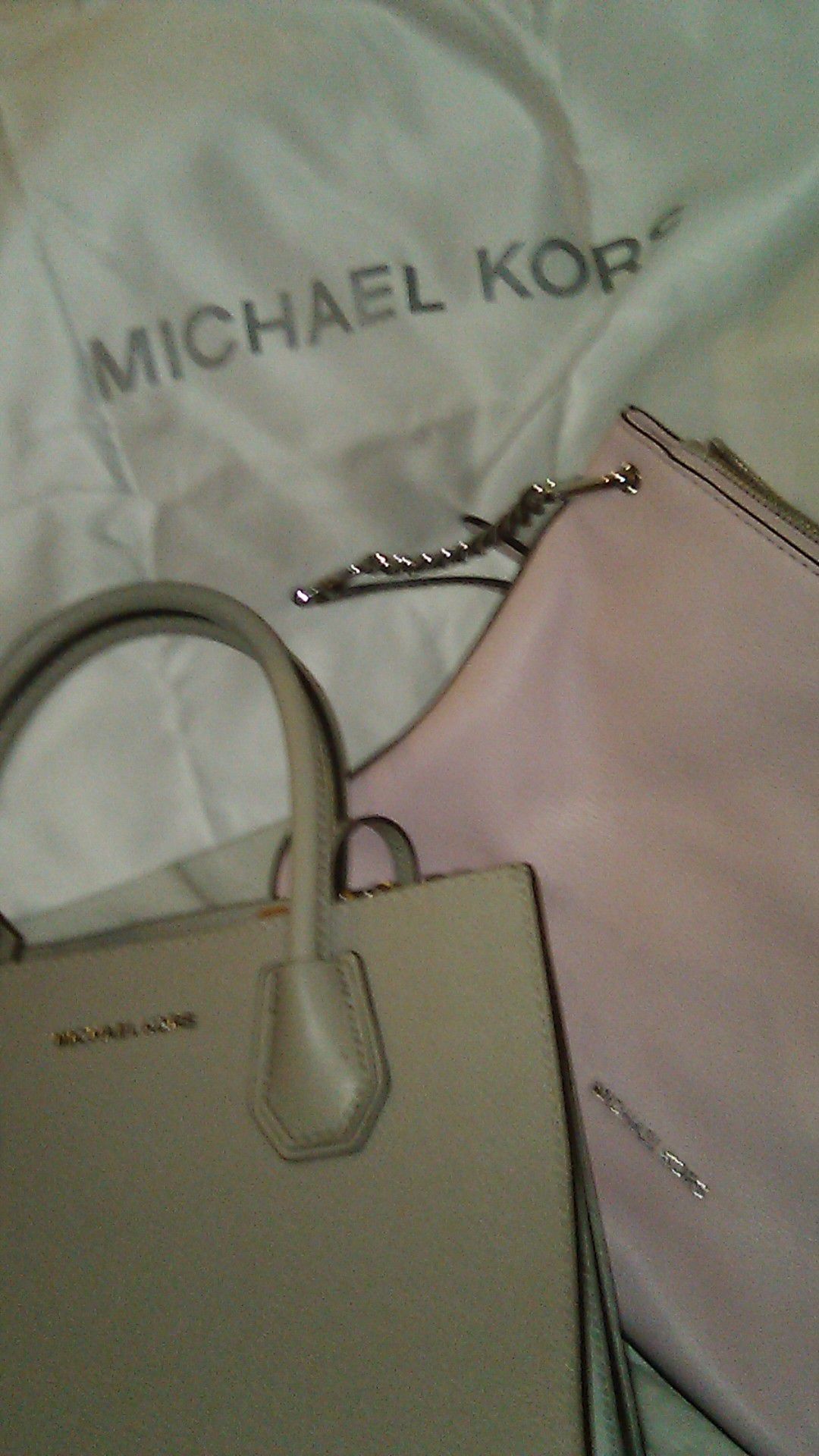 Michael Kors hand bags and carrying tote.