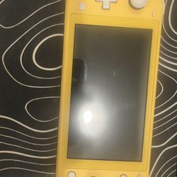 Nintendo Switch Lite (Comes with Super Smash Bros)