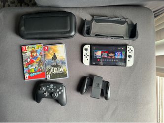 Nintendo switch  OLED with extra accessories and games