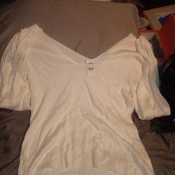 Free People Phoebe Pullover sweater in white with puff sleeves. 