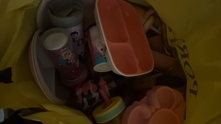 Bag of kids pink bowls, cup, plates