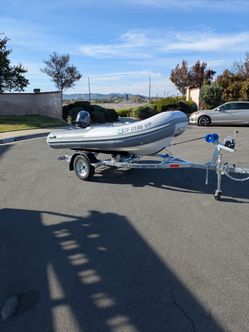 Hard Bottom Inflatable Dinghy With 15 HP Yamaha Outboard