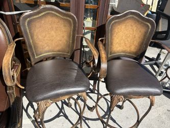 Two Chairs Swivel 