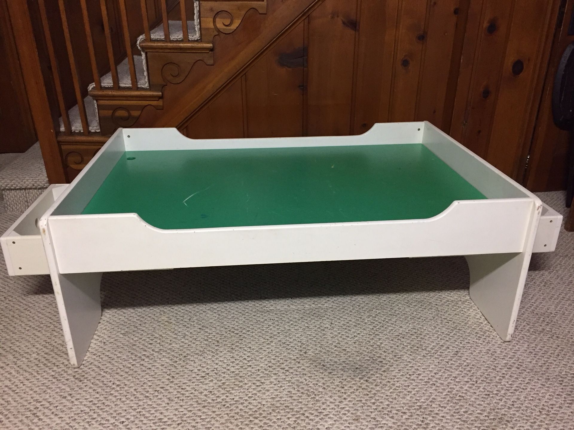 Kids train table with 2 drawers for storage.