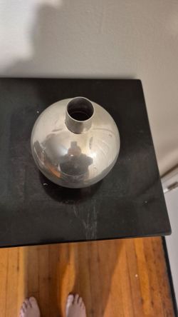A set of 4 Silver Orb Candle Holders