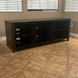 65-inch tv Stand for 55/60/65/70 Inch TV. With Top Glass With 5 Storage Cubby Center And Power Outside