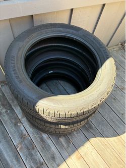2 like-new tires under 2k miles (225/55R19)