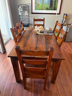Farmed mahogany dining set
