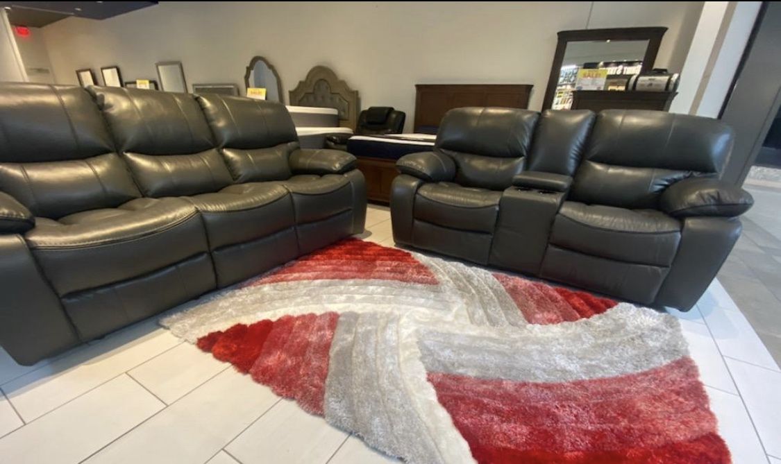 Going out of business sale. Madrid, gray leather reclining sofa and loveseat set now $1099. Easy finance option. Same-day delivery.