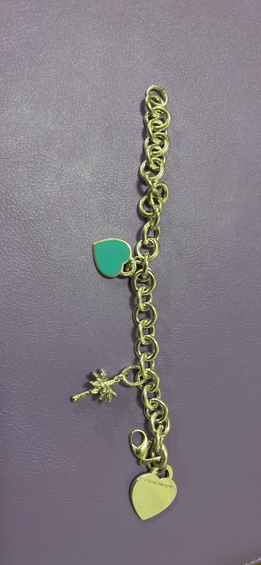 Sterling Silver Tiffiny Bracelet with 2 added charms