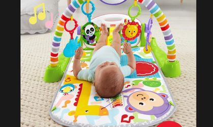 Fisher price play mat. No piano.