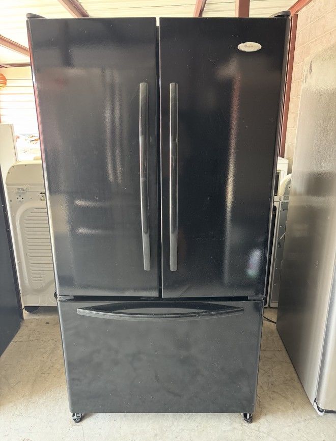 Black Whirlpool Refrigerator And Freezer