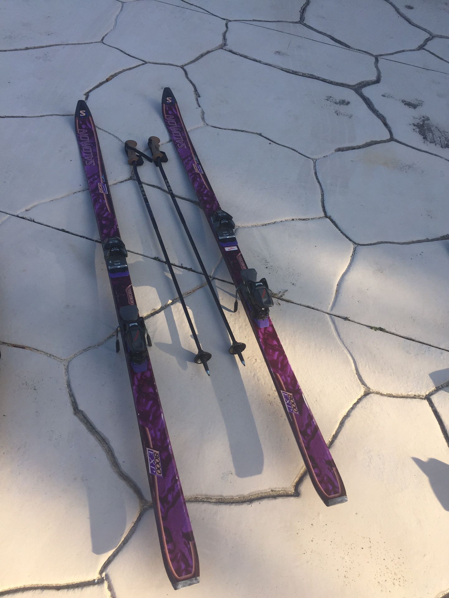 Salomon snow skis and poles