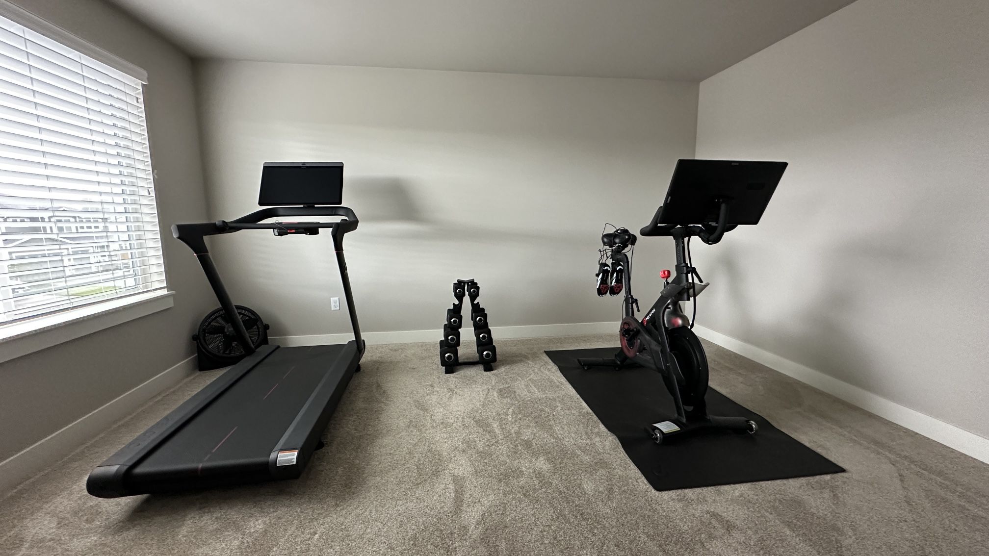Peloton Treadmill + Stationary Bike + 4 Sets Of Dumbbells 