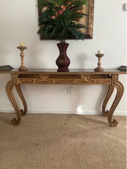 A unique, heavy smoke glass table