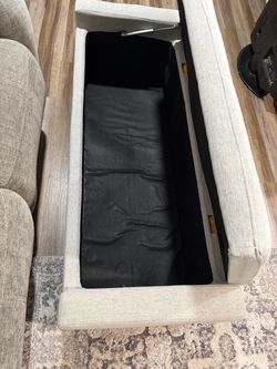 Light Gray Upholstered Storage Ottoman