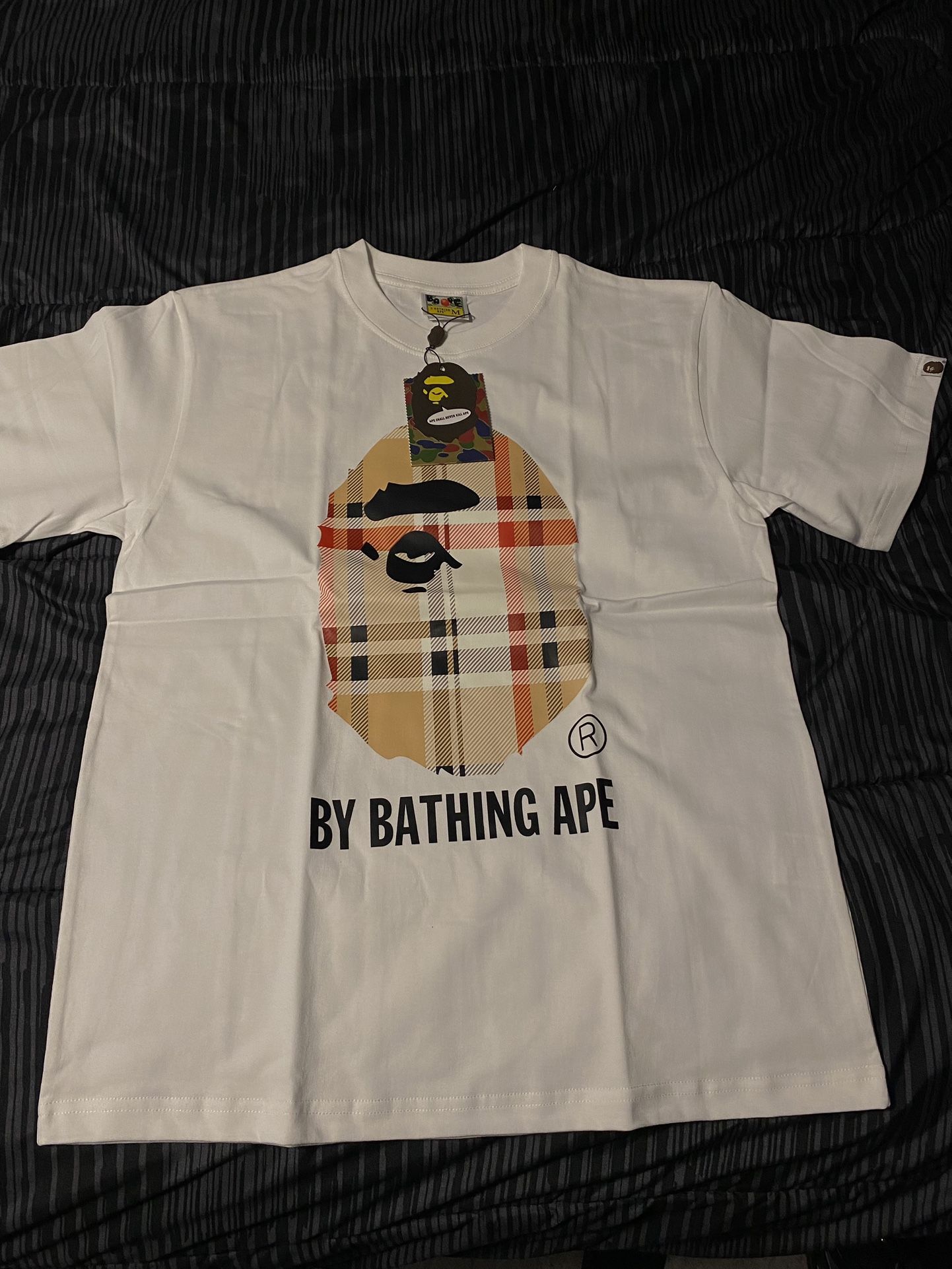 White Bape/burberry shirt.