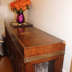 Ottoman that holds old plates and dishes or anything of your choosing