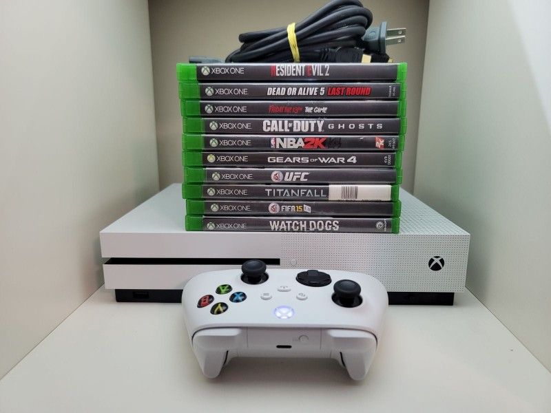 xbox one s am giving it out to bless someone who first wish me happy wedding anniversary on my cellphone number now  707^340^9916