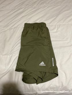 Real olive green adidas running shorts